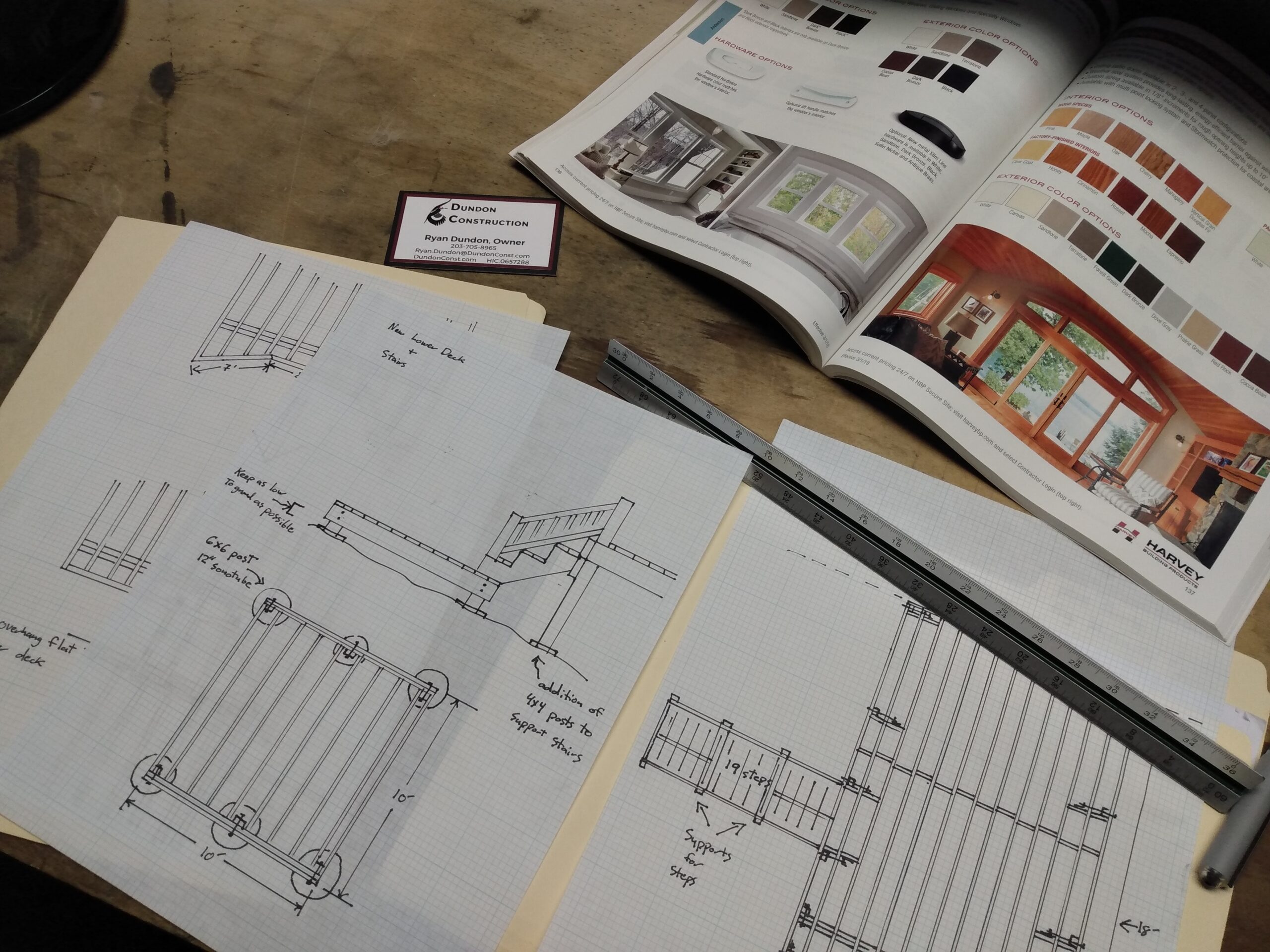 Desk with open schematics.